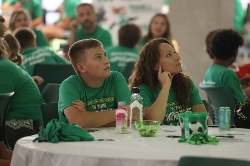 Sarah Pfiffer and her son, Logan, an incoming freshman at Providence Catholic watch the Atlanta and Miami soccer match at the Providence Catholic Brad Guzan watch party on Tuesday, July 25 in New Lenox. Guzan is a Providence Catholic alumnus who plays goalie for MLS’ Atlanta United FC.
