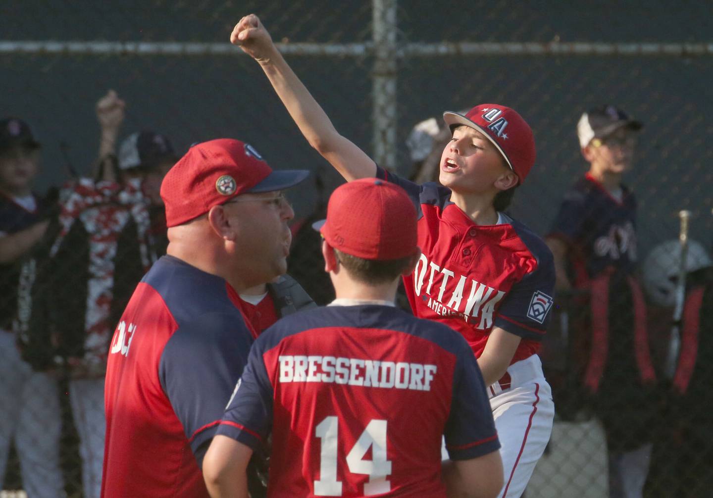 Ottawa American pitcher Rocco Affrunti (top) reacts after striking out a Streator All Star player during the District 20 championship game on Sunday, July 14, 2024 at Washington Park in Peru.
