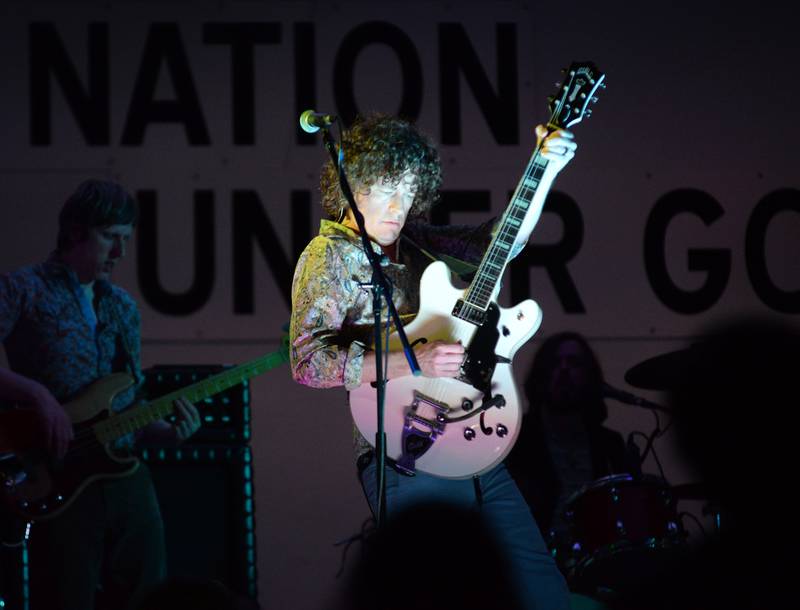 A member of Fortunate Sons, a Creedence Clearwater tribute band, plays a guitar solo during the Jamboree Concert Series in Mt. Morris on Friday, Aug, 29, 2025.