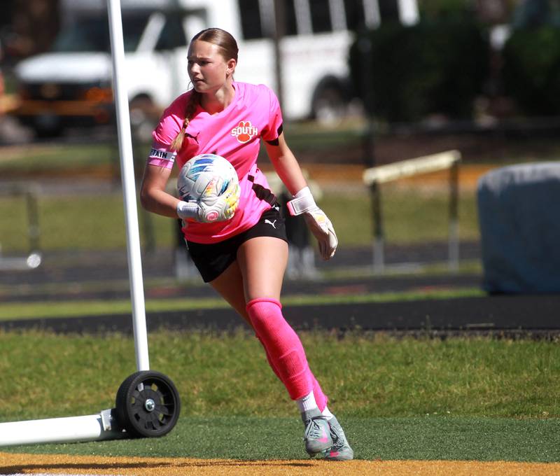 Wheaton Warrenville South goalkeeper Marilyn Dixon gets the ball during a game against St. Charles East on Friday, May 16, 2025 in Wheaton.