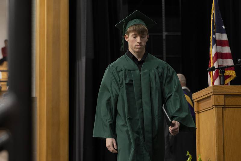 Gage Tarner moves across the stage Sunday, May 18, 2025, for RFHS’ 2025 commencement. Tarner was one of 131 students to graduate.