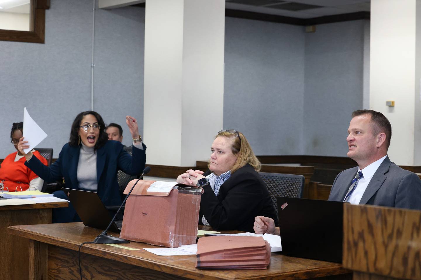 Kankakee County State's Attorney Jim Rowe, right, and defensive attorney Cierra Norris, second from left, argue an issue with Judge Kathy Bradshaw-Elliott during court proceedings for Xandria Harris, left, on Friday, Feb. 13, 2026, ahead of the trial beginning Feb. 23.
