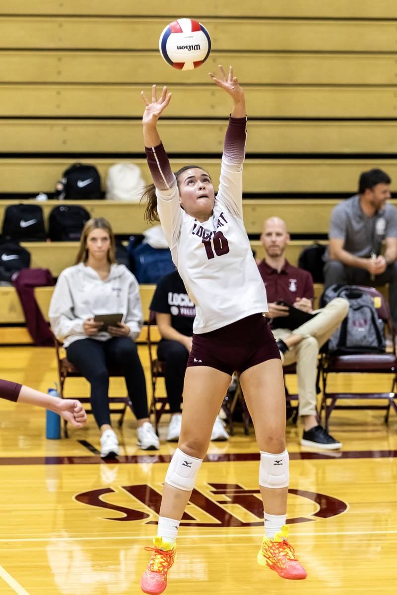Lockport's Natalie Bochantin sets-up a teammate during a varsity volleyball home game against Joliet West on Sept. 17, 2025.