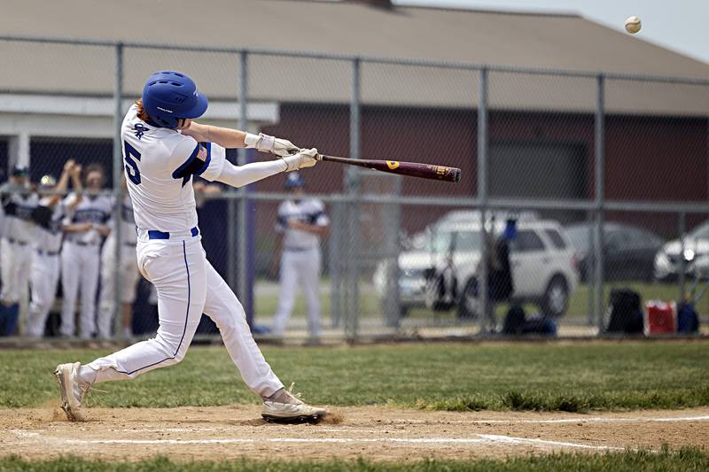 Burlington Central’s Michael Person drives the ball over the fence against Sterling during a class 3A regional final in Rochelle Saturday, May 27, 2023.