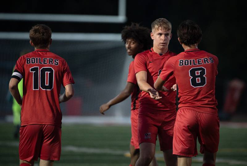 Bradley-Bourbonnais' Jack Watters congratulates Gaudalupe Valadez, right, on his goal against Manteno in a game on Tuesday, September 16, 2025.
