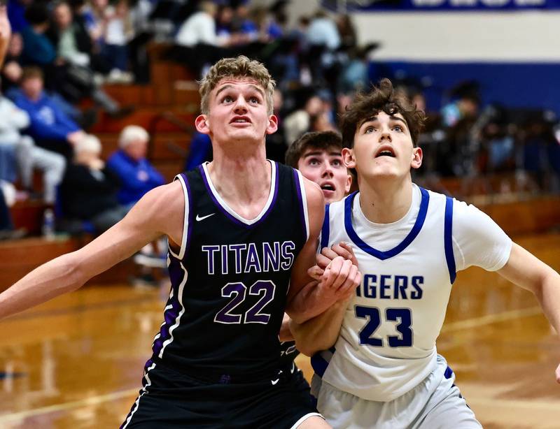 Princeton's Hayden Sayler and El Paso-Gridley's Elijah Webster battle for position Tuesday night at Prouty Gym. The Titans defeated the Tigers 75-59.