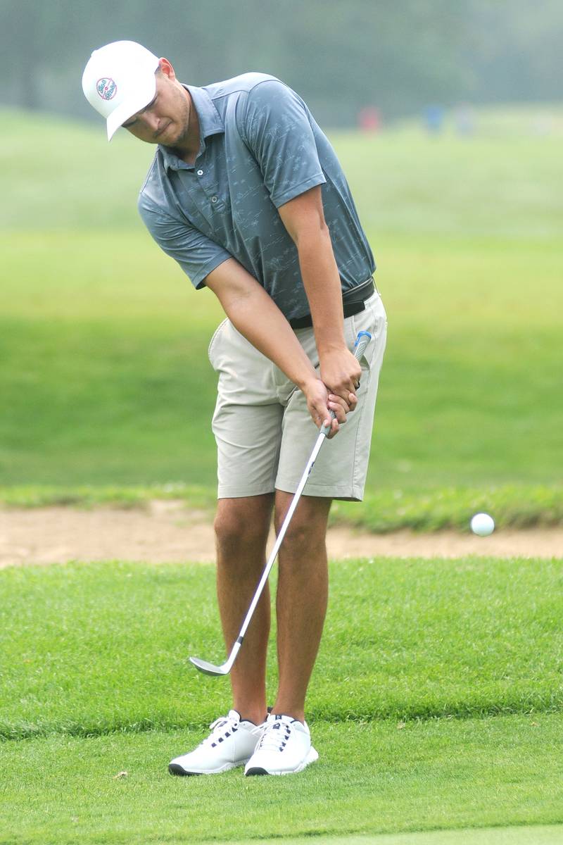 Baley Lehr chips in during the 2023 playing of the Berry Memorial Championships at the Eastwood in Streator.