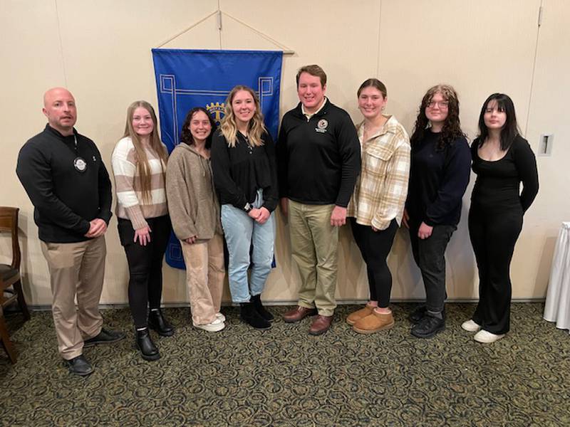 Caption left – right: Tom Myers, Rock Falls Rotary Youth Committee Chair; Carli Kobbeman, Student of Month; Mayson Burns, Student of the Month; Representative Brad Fritts; Claire Bickett, Student of the Month; Angela Gallentine, Student of the Month; and Rotary Youth Exchange outbound student to France, Kenedi Woodyatt.