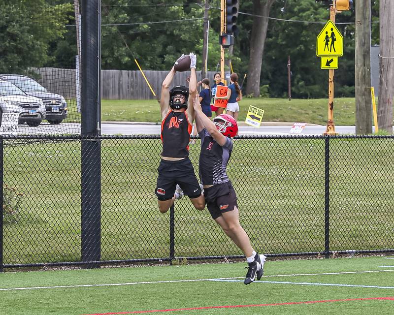 Minooka's Ethan Vescovi leaps for a catch during the Downers Grove South 7 on 7 football tournament, July 12, 2025  in Downers Grove.