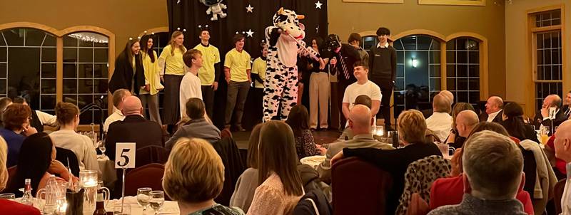 The WACC CEO students performing “The Adventures of Space Cow” at the Sauk Valley Area Chamber of Commerce annual dinner