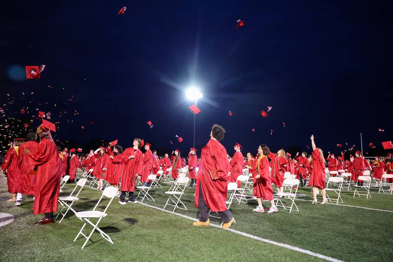Graduates throw their hats in celebration at the conclusion of the Bradley-Bourbonnais Community High School commencement ceremony on Thursday, May 21, 2026.
