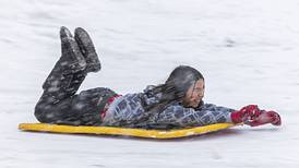 Photos: Dixon digs the snow