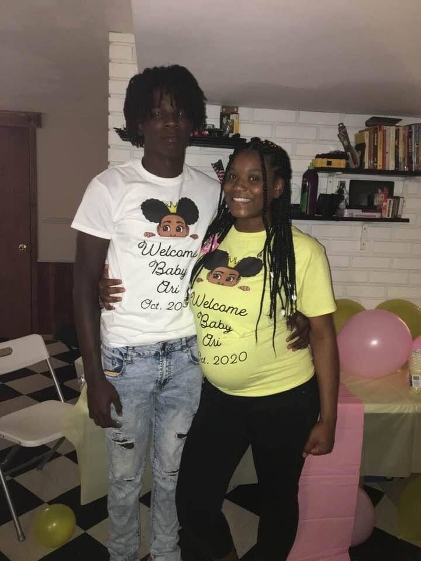 Marlon King Jr., a 2022 DeKalb High School graduate, stands with Tamiah Griffin, in 2020 as they prepare to welcome their baby Ari. King was fatally shot May 11, 2023 in DeKalb. Two men, Jayden C. Hernandez and Carreon S. Scott, also of DeKalb, are charged with first-degree murder in his death.