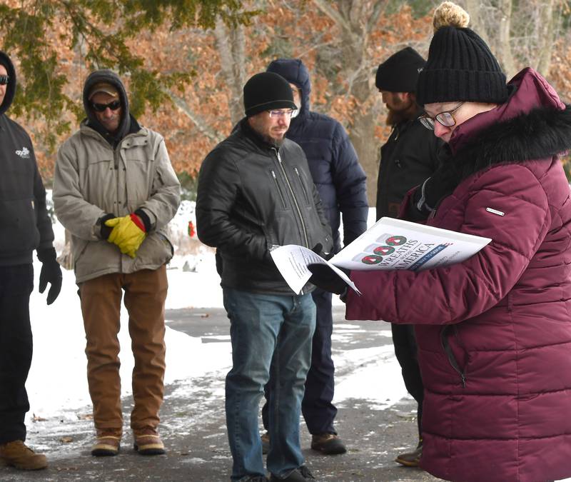 Laurie Carlin-Perry (right) speaks at the Wreaths Across America program at the Daysville Cemetery on Saturday, Dec. 13, 2025.