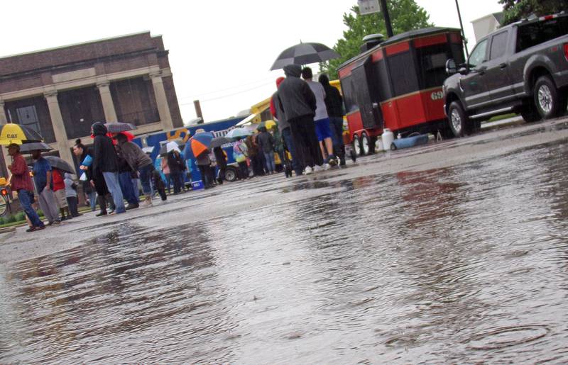 Early rain showers didn't stop people from coming Saturday, May 21, 2022, to the Streator Food Truck Festival at City Park.