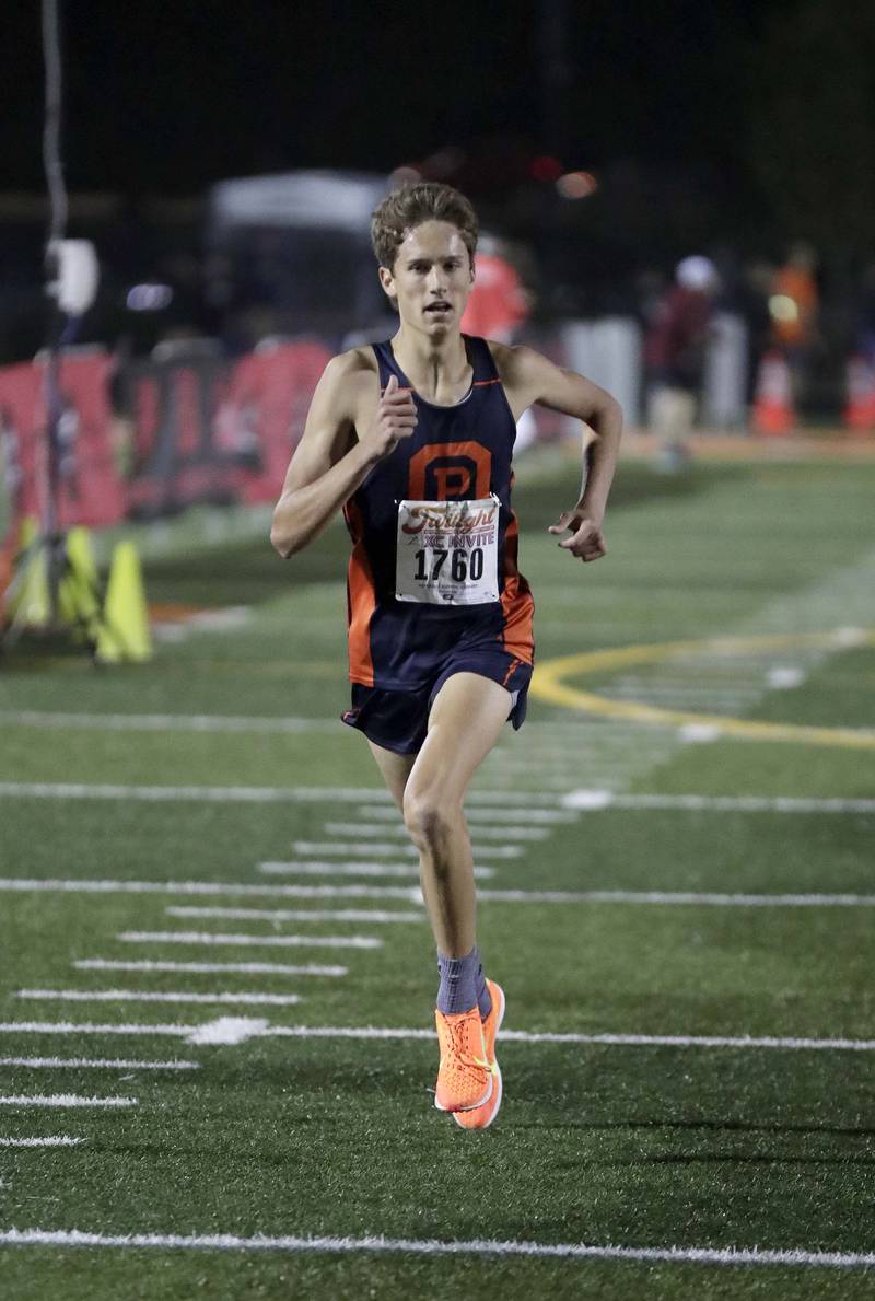 Photos Naperville North's Twilight Invitational cross country meet