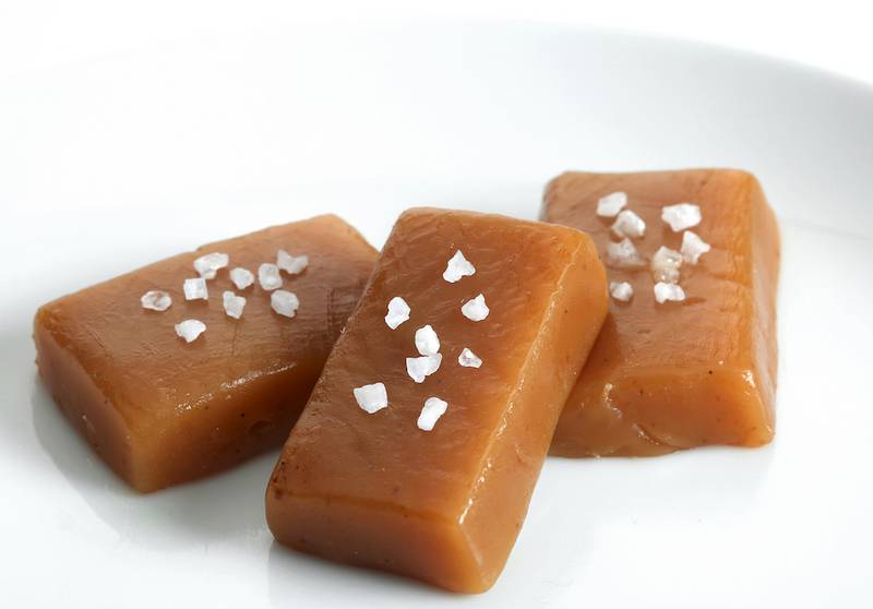 A simple soft caramel from "Chocolates and Confections, at Home with the Culinary Institute of America," is the easiest way to go.