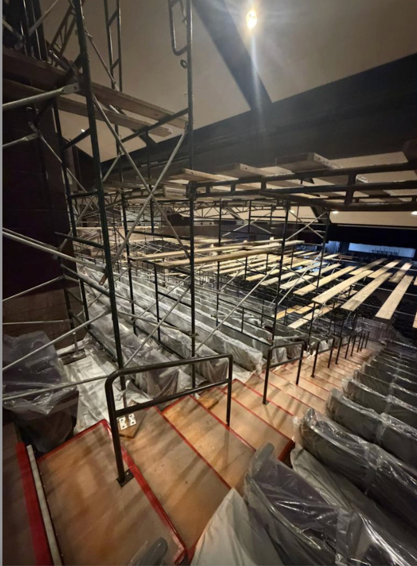 Oswego East High School’s Performing Arts Center is expected to reopen in early February after being closed for emergency repairs following a recent investigation that revealed fireproofing problems and ceiling integrity issues.