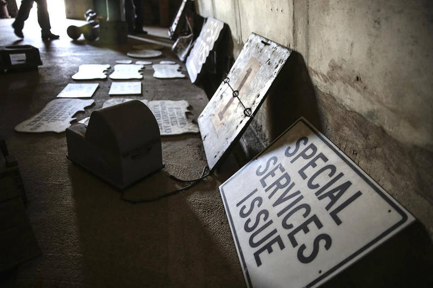 Several arsenal artifacts sit in one of the bunkers used to house ammunition during World War II on Wednesday, Nov. 8, 2017, at the site of the former Joliet arsenal in Wilmington, Ill.