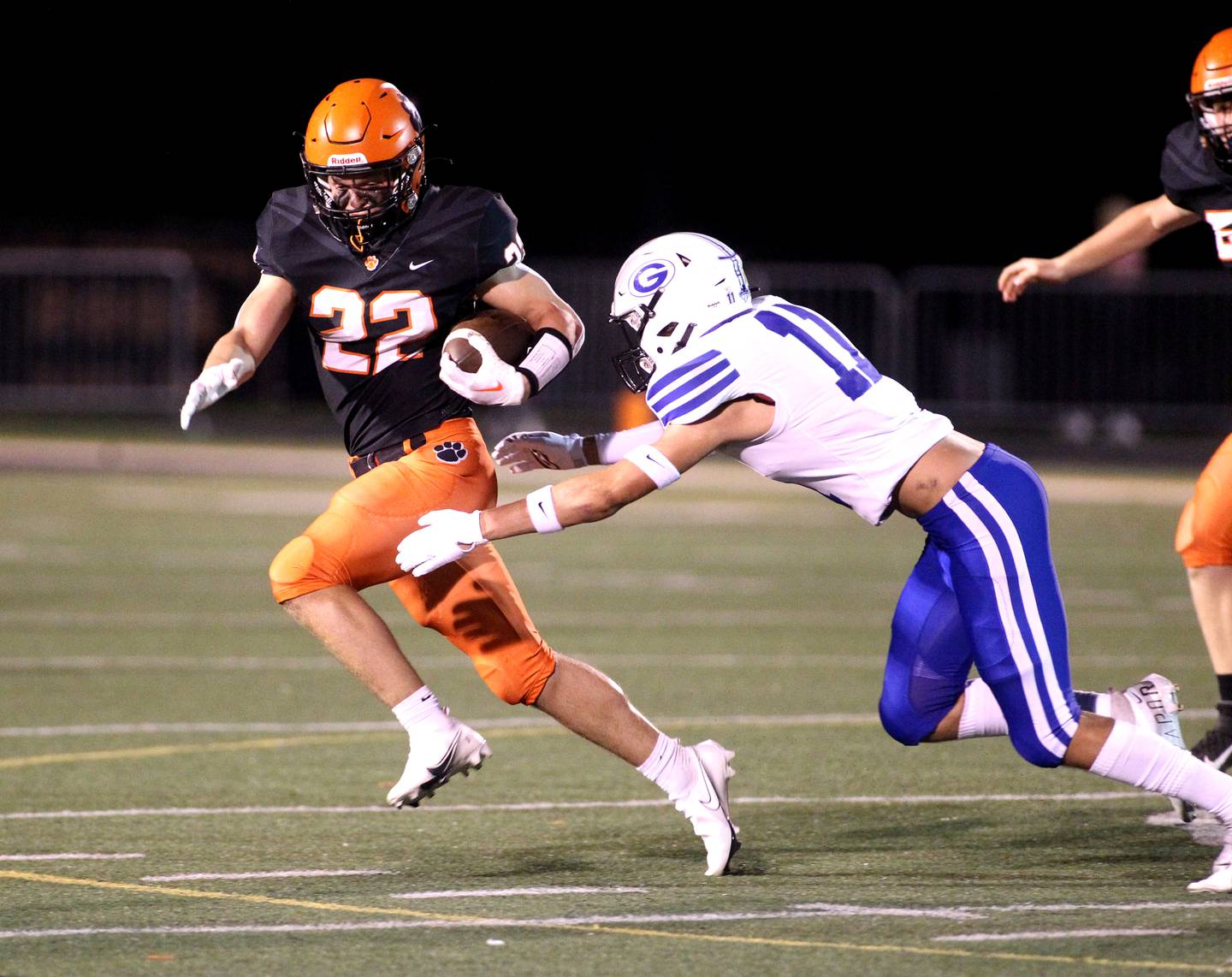Wheaton Warrenville South’s Jake Vozza (22) carries the ball during a home game against Geneva on Friday, Sept. 16, 2022.