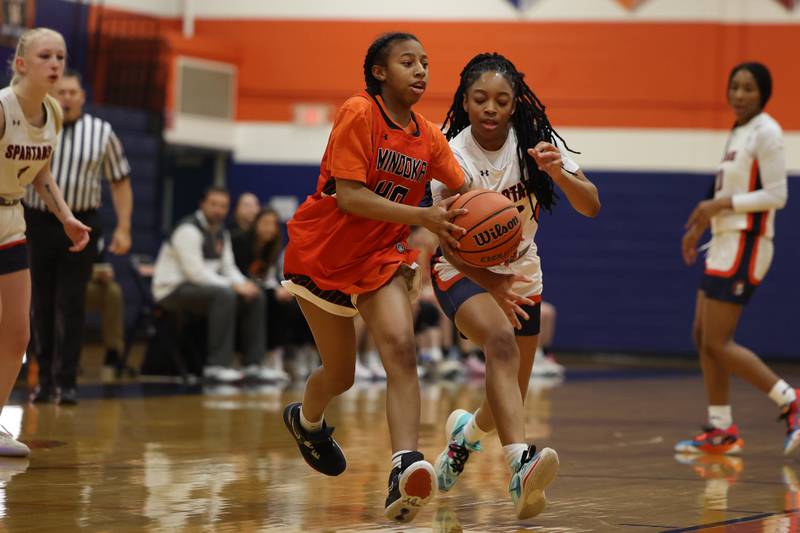 Minooka’s Kendall Thomas looks for a play against Romeoville on Tuesday January 24th, 2023.