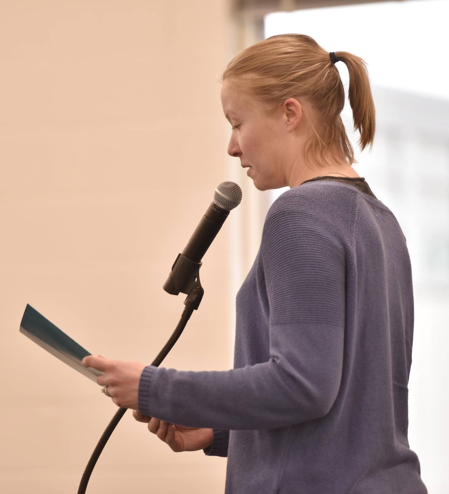 St. Charles North High School English teacher Alice Froemling speaks to the District 303 school board about the involuntary reassignment of herself and several other teachers in the district at Monday’s meeting.