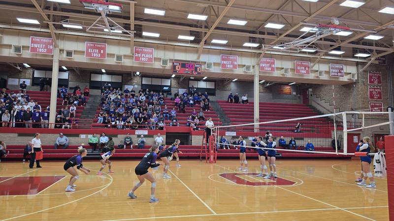 The Dixon volleyball team waits to receive Limestone's serve in the Class 3A Ottawa Township Sectional semifinals on Tuesday, Nov. 5, 2024. Limestone won 25-14, 25-20.