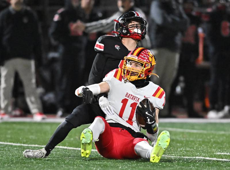 Batavia's Brett Berggren (11) catches a pass for a first down during the Class 7A semifinal playoff game against Lincoln-Way Central on Saturday, Nov 23, 2024 at New Lenox. (Dean Reid for Shaw Local News)