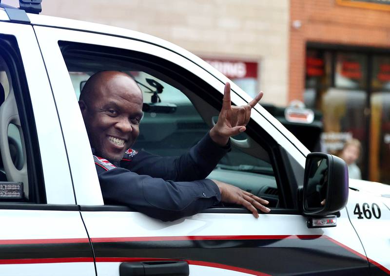 Northern Illinois University Police Chief Darren Mitchell rides in the March of the Huskies parade during the NIU Huskie Homecoming Block Party Thursday, Oct. 12, 2023, in downtown DeKalb.