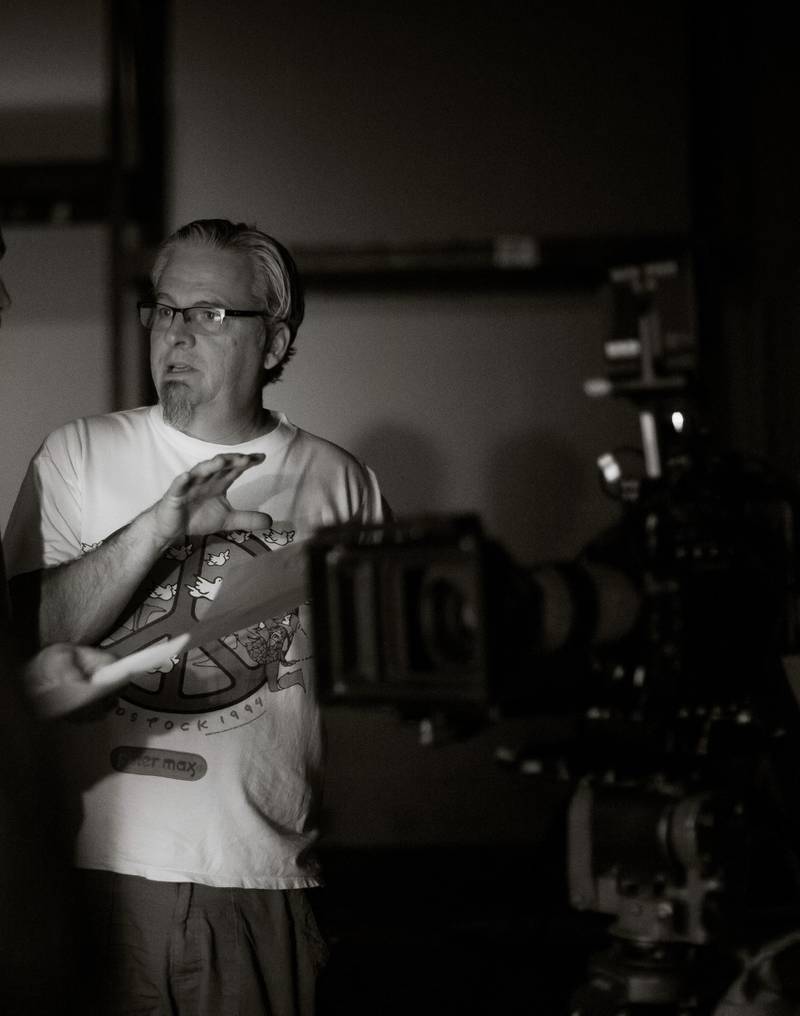 Kevin Lockhart of Lakemoor — writer, producer and owner of "High on the Hog" — talks with a director during the making of the 2019 film. The movie will be among three shown at the McHenry Outdoor Theater on Halloween, Oct. 31.