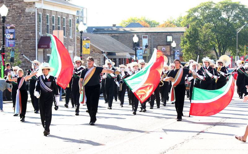 Members of the L-P band march in the Homecoming parade on Thursday, Oct. 5, 2023 downtown Peru.