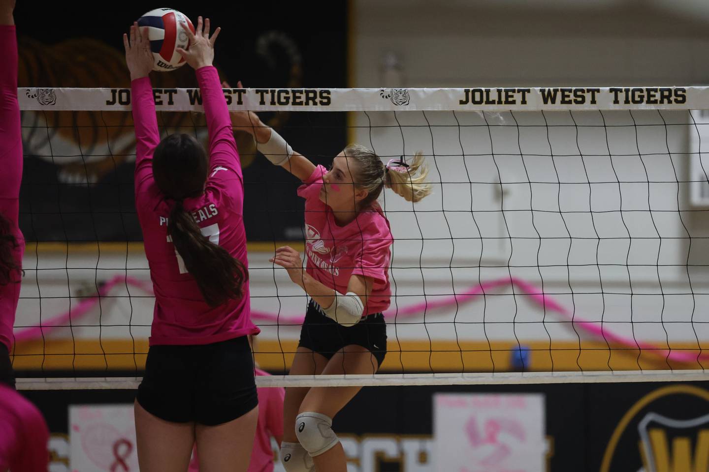 Joliet West’s Ava Grevengoed powers a shot against Joliet Central in the JTHS Pink Heals match. Tuesday, Oct. 4, 2022, in Joliet.