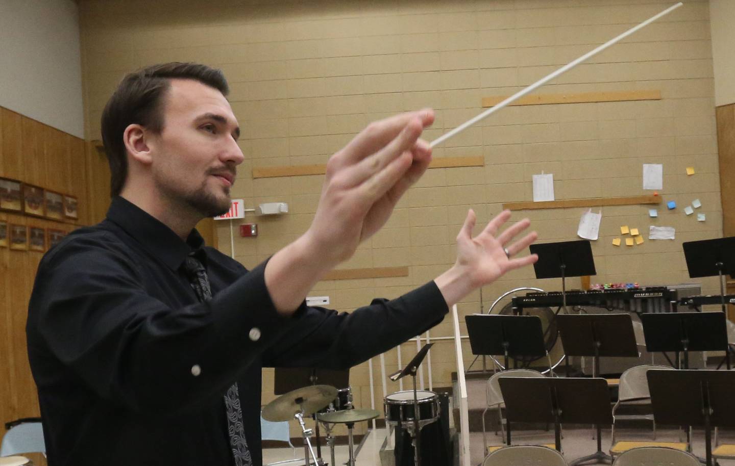 Martin Czernicki practices conducting a piece in his classroom on Thursday, March 20, 2025 at Shepherd Middle School in Ottawa.