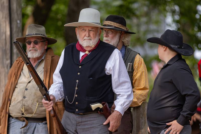 Actors from the Old West Regulators group participate in a reenactment of the life of Wild Bill Hickok behind the LaSalle County Historical Museum during Wild Bill Days on May 31, 2025 in Utica.