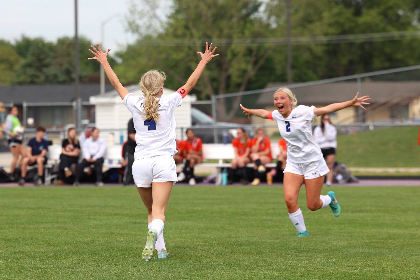 Peotone's Peyton Bisping, right, runs to celebrate teammate Allie Werner's tying goal in the first half during Peotone's 2-1 victory over Beecher in the Class 1A Manteno Regional championship on Friday, May 22, 2026.