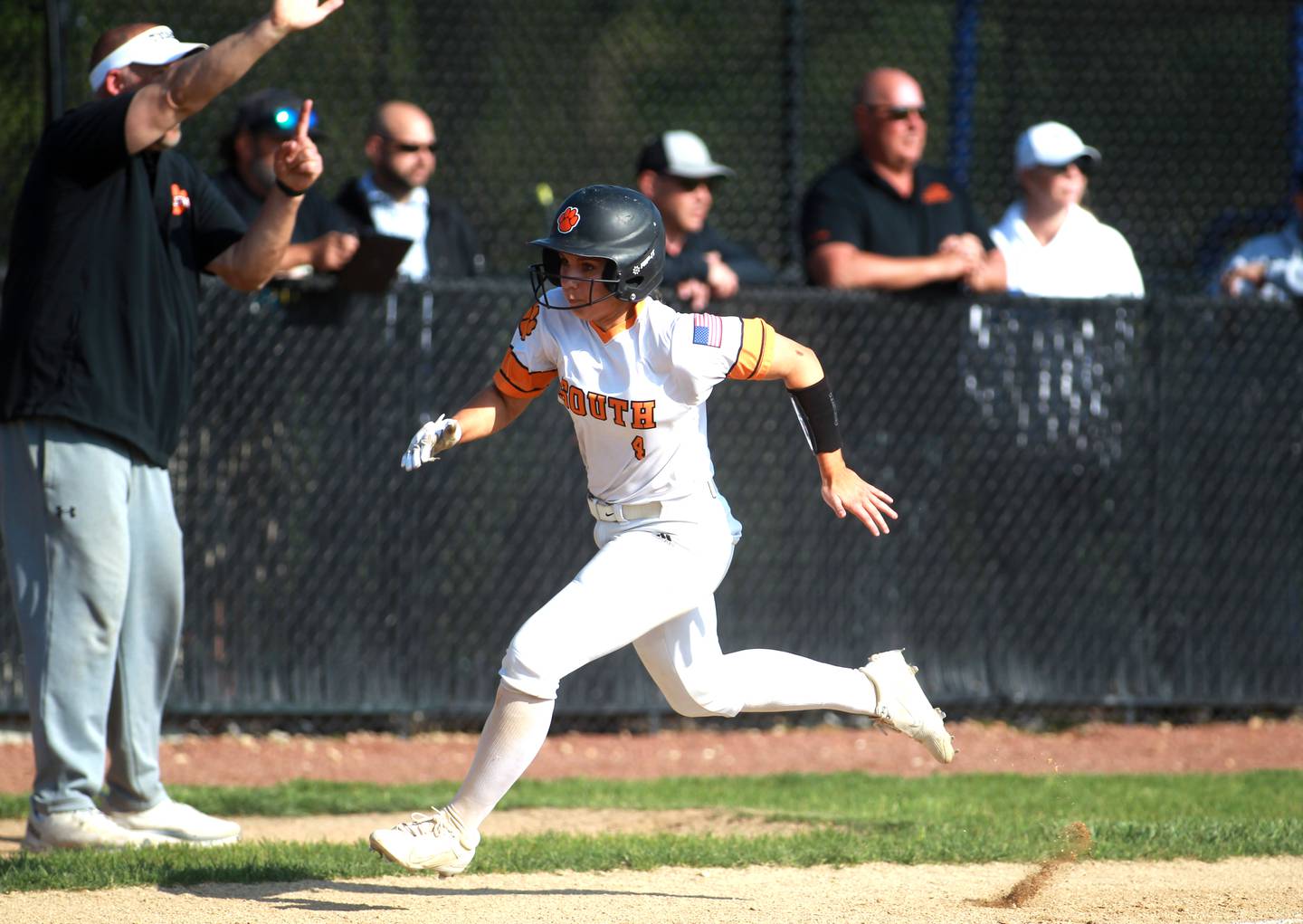 Wheaton Warrenville South’s Abby Mease rounds third base for a run during a game at St. Charles North on Monday, May 6, 2024.