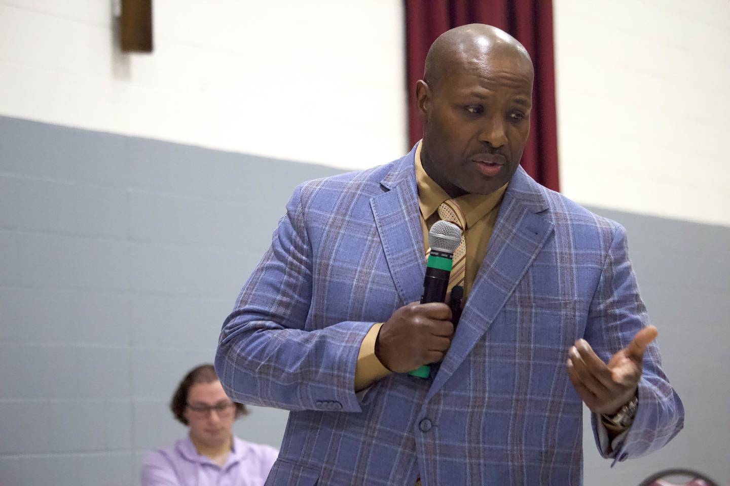 Will County Sheriff's Sgt. Patrick Jones speaking to the audience on Wednesday, Jan. 28, 2025 at the community center at St. John's United Church of Christ in Mokena.