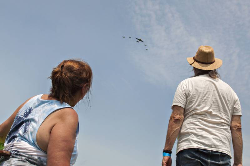 Planes fly overhead during the start of the ACCA Air Show on Saturday, July 24, 2021, at Whiteside County Airport in Rock Falls.