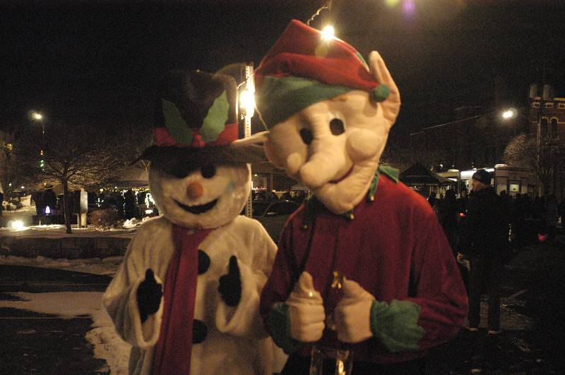 Frosty  and one of Santa's elves stop for a photo near Santa's workshop in Sterling. The  Sights & Sounds is Sterling’s kickoff to the holiday season. The event in downtown Sterling was held on Friday, December 5, 2025.