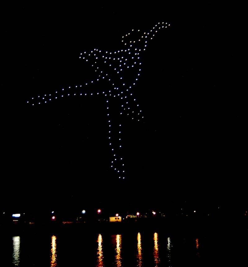 A dancer is created at the drone light show on Venetian Night in Dixon. The night featured magicians, street performers, face painting, a spaghetti eating contest, mini boat races, and a drone light show. The Discover Dixon event was held along the riverfront in Dixon on Aug. 9, 2025.