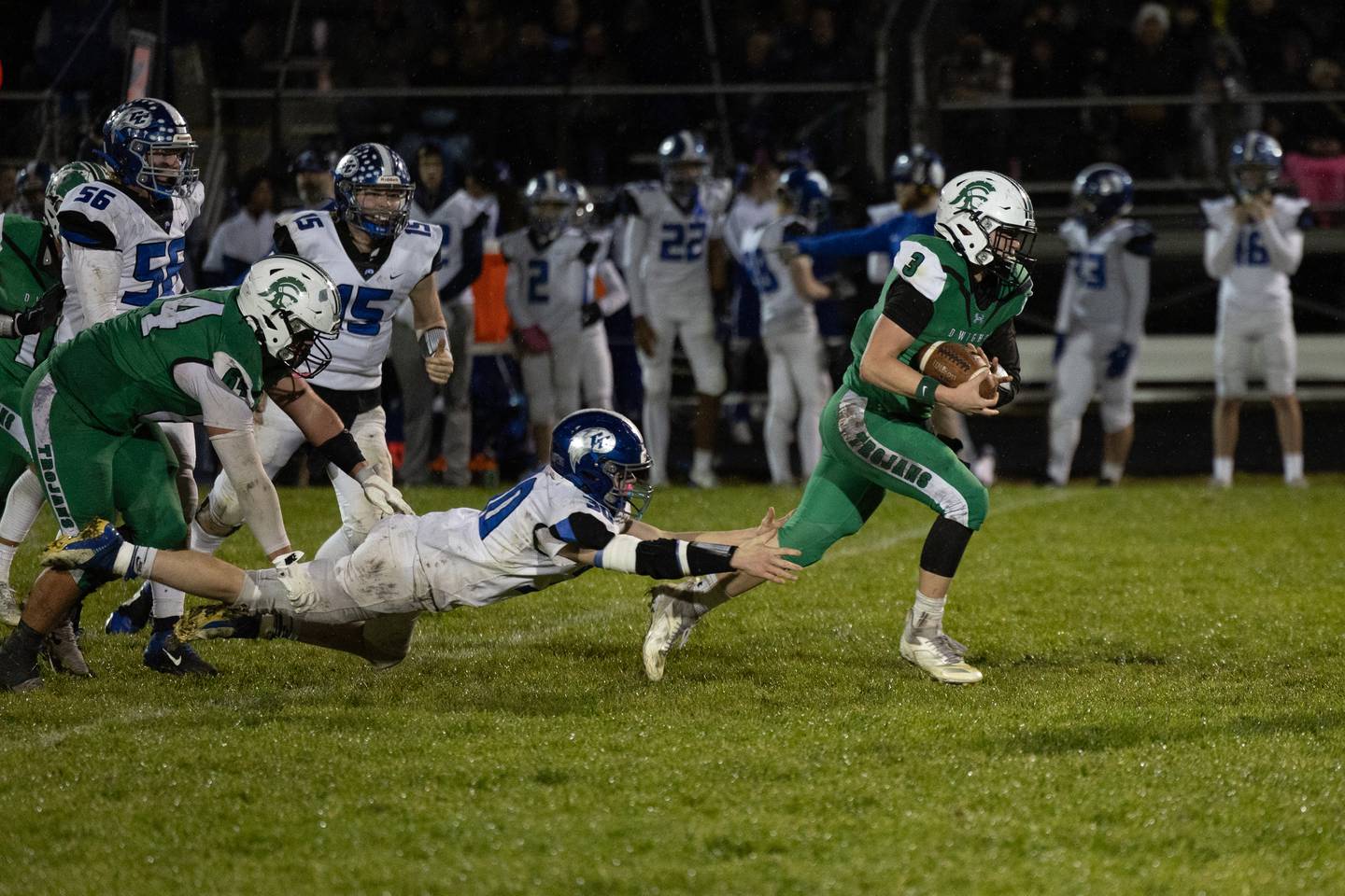 Dwight's Collin Bachand escapes the grasp of Clifton Central's Blake Chandler on his way to his second defensive touchdown in the first half during Dwight's 43-14 victory over Clifton Central in second round playoffs on Saturday, Nov. 8, 2025.