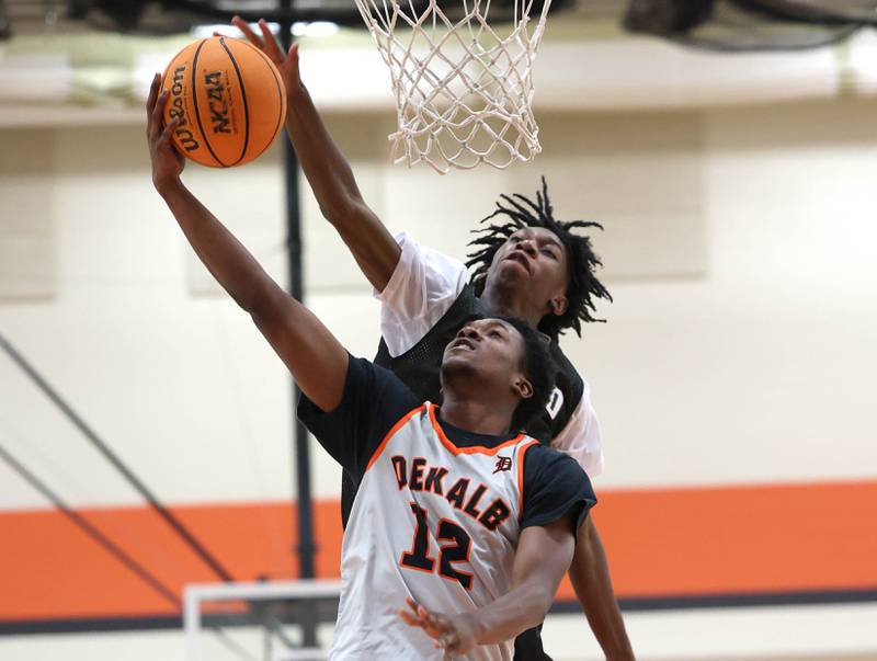 DeKalb’s Derrion Straughter gets to the basket ahead of a defender Friday, June 20, 2025, during their game against Streamwood in the DeKalb Live summer tournament at DeKalb High School.