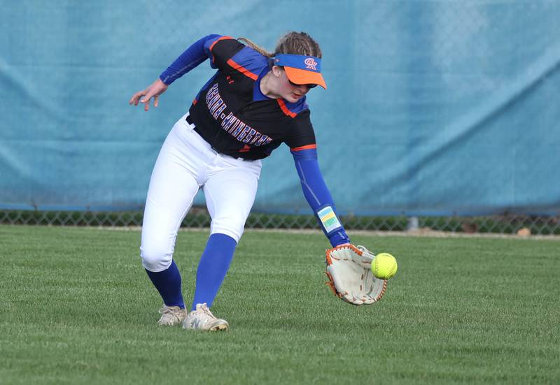 Genoa-Kingston’s Abigail Fellows fields a ball in the outfield during their game against Winnebago Monday, April 21, 2025, at Genoa-Kingston High School.