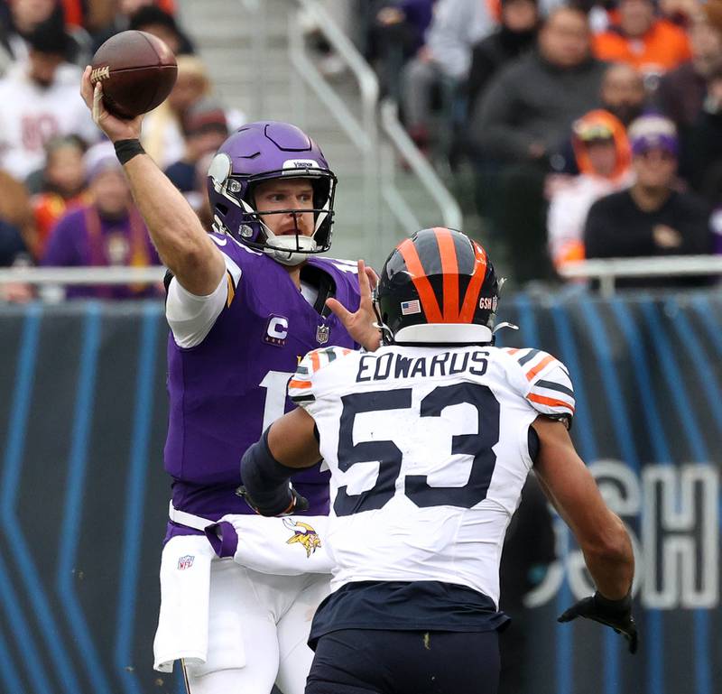 Chicago Bears linebacker T.J. Edwards closes in on Minnesota Vikings quarterback Sam Darnold as he throws the ball during their game Sunday, Nov. 24, 2024, at Soldier Field in Chicago.
