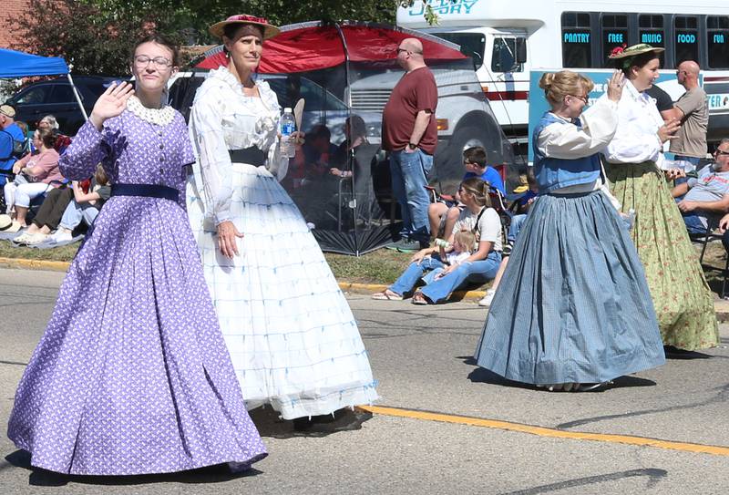 Bureau County Historical Society volunteers walk during the 52nd annual Homestead Festival parade on Saturday, Sept. 9, 2023 in Princeton.