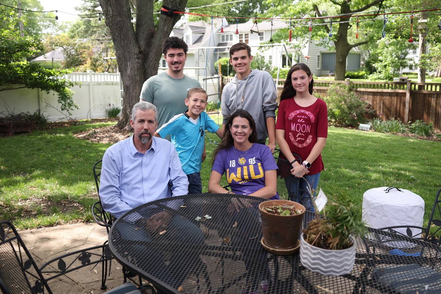 Joshua and Amber Ruland with their children, left, Brayden, 19, Emerson, 10, Micah, 15, and Ella,13. Tuesday, May 24 2022, in Plainfield.