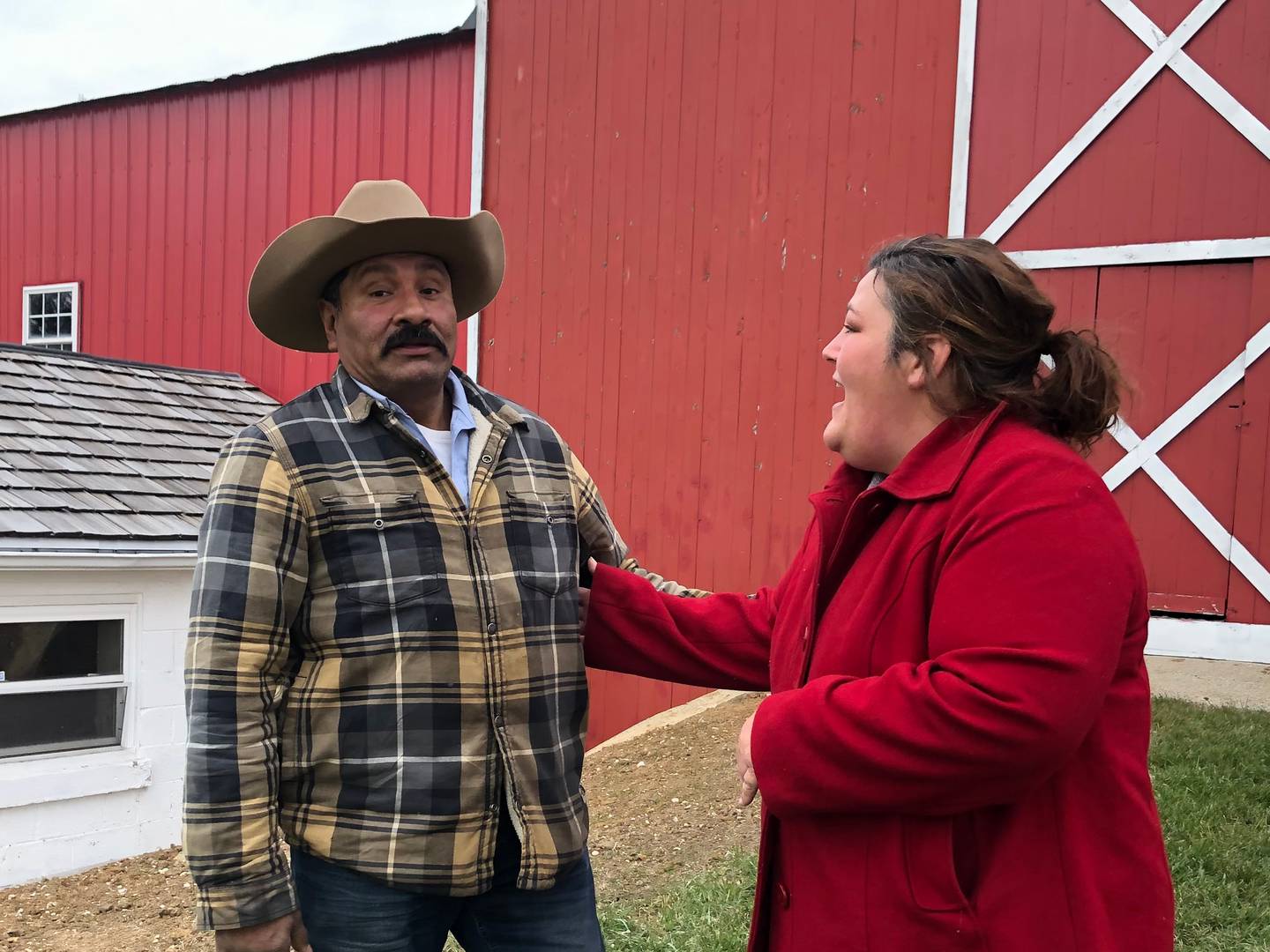 Rancho El Calate owner Roberto Antunez, left, and mural artist Melissa Wallace talk Wednesday, Nov. 24, 2021, about the recently completed mural at the ranch outside Ringwood.