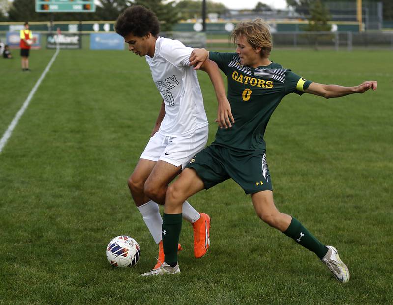 Crystal Lake South's Blake Marunde (right) tries to force Huntley's Talon Sargent off the ball during a Fox Valley Conference soccer match on Thursday, Sept. 28, 2023, at Crystal Lake South High School.