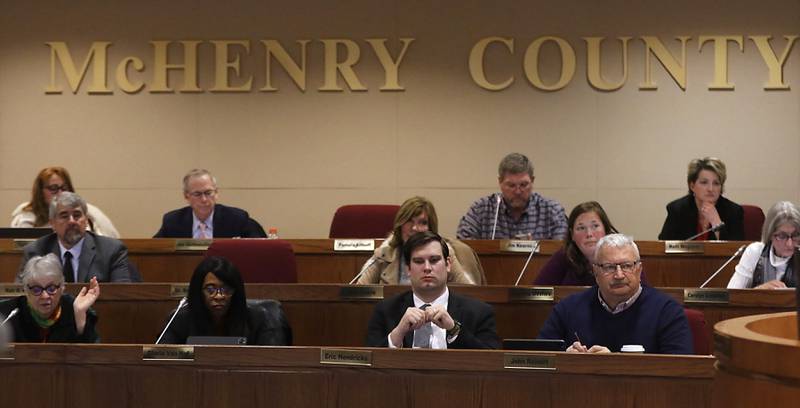 McHenry County Board members vote on a resolution opposing the Illinois gun ban and supporting its repeal at the McHenry County Board meeting Tuesday, Feb. 21, 2023, in the McHenry County Administration Building.