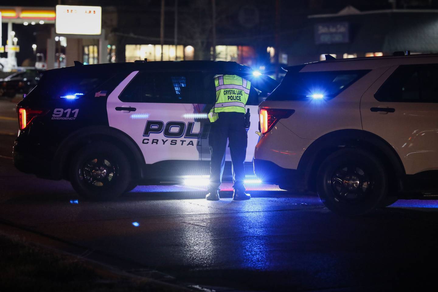 Crystal Lake police investigate a car versus pedestrian crash that occurred at Route 14 and Pingree Road about 7 p.m. Monday, Dec. 20, 2021.